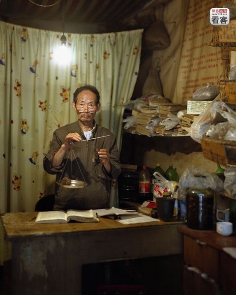 a chinese medicine store owner in shibatai of chongqing