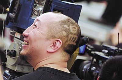 a news camera man's fancy haircut