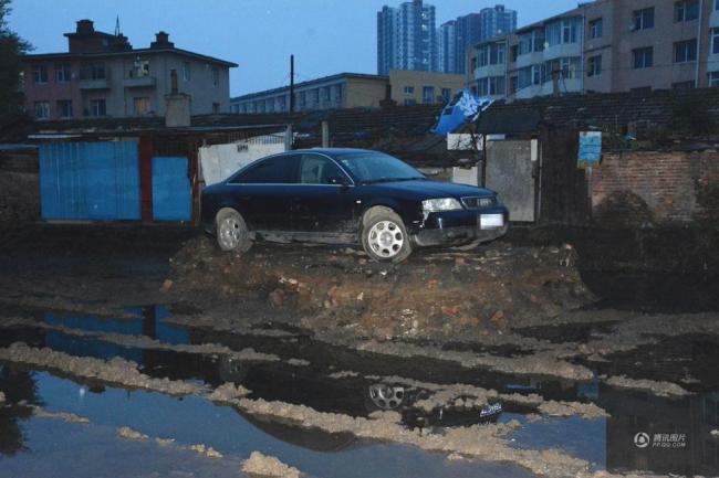 A car left in a construction site at Jilin City