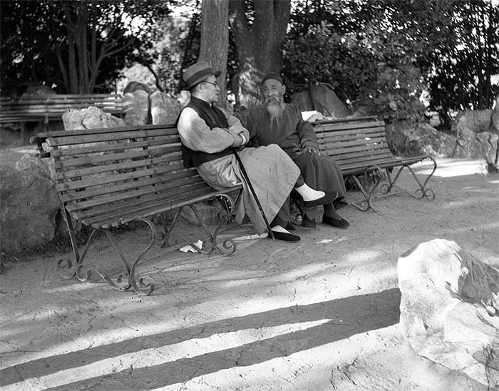 men talking on bench, old shanghai life