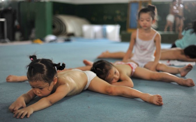 gymnasts training from very young